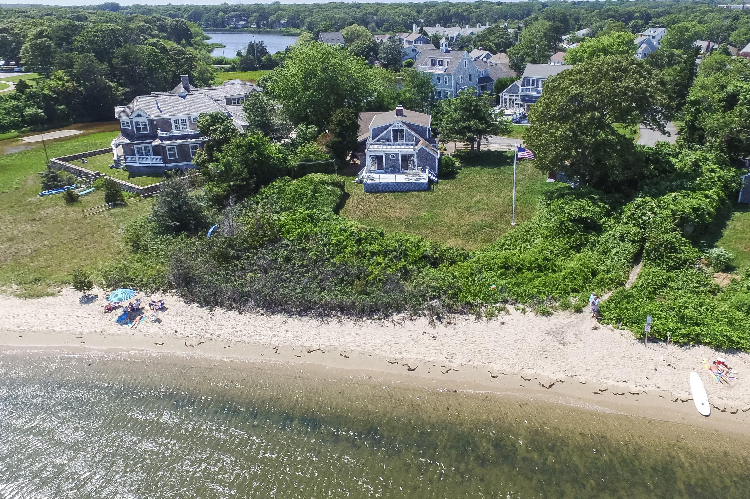 75 Harbor Bluff Road Hyannis, MA 02601 - Photo 1 of 31 an aerial view of a house with a yard