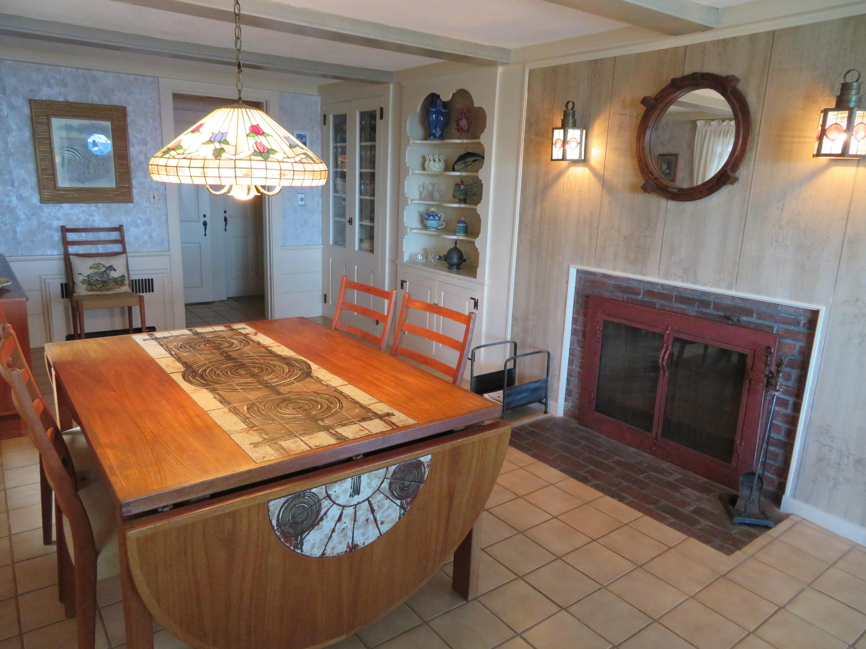 75 Harbor Bluff Road Hyannis, MA 02601 - Photo 14 of 31 a living room with fireplace furniture and a mirror