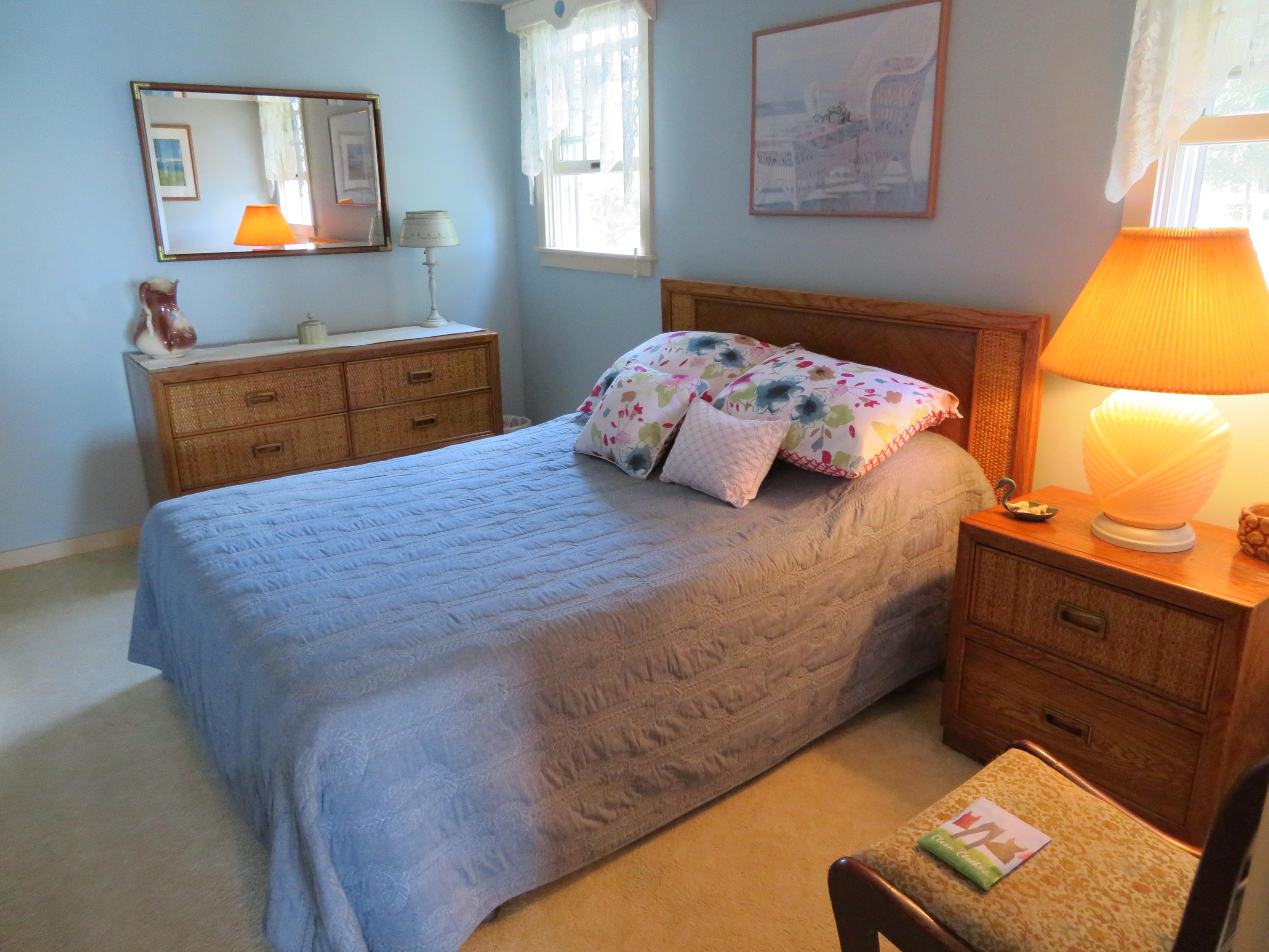 75 Harbor Bluff Road Hyannis, MA 02601 - Photo 16 of 31 a bedroom with a bed window and dresser