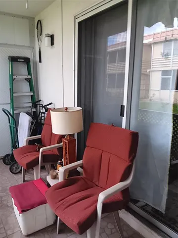a room with furniture and a chair