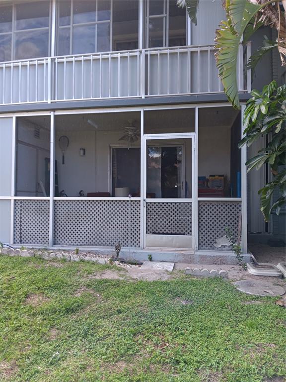503 Saxony Drive, Unit 503 Delray Beach, FL 33446 - Photo 21 of 21 a view of a house with a window and a yard