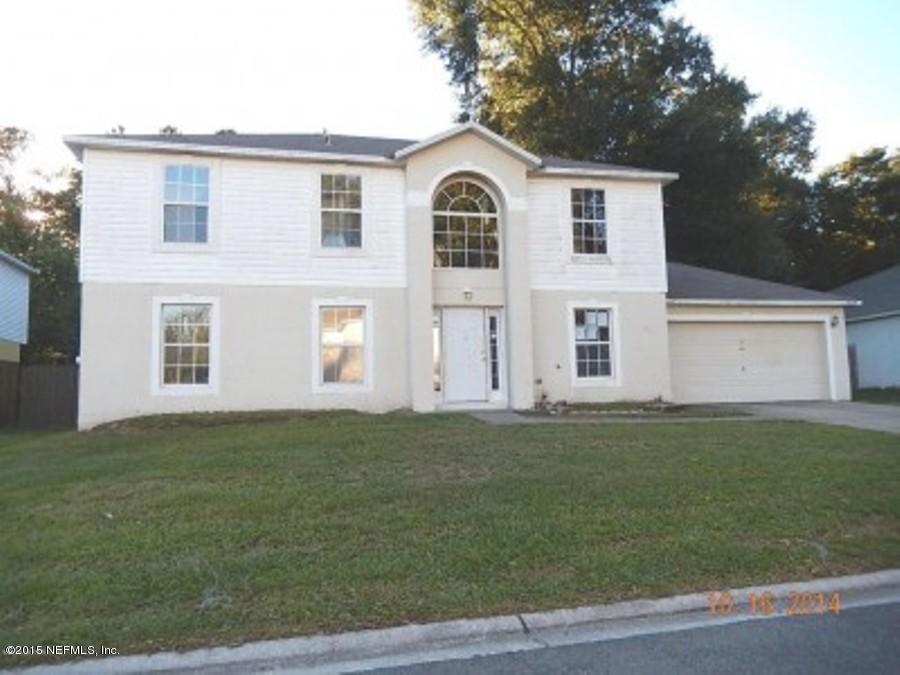 12428 Hickory Forest Road Jacksonville, FL 32226 - Photo 1 of 1 a view of a back yard of the house