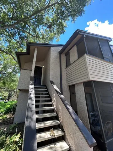 a view of a house with a deck
