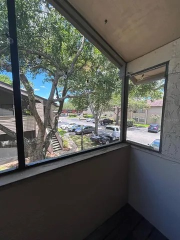 a view of a large window with an outdoor space