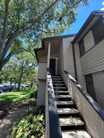 a view of backyard with deck