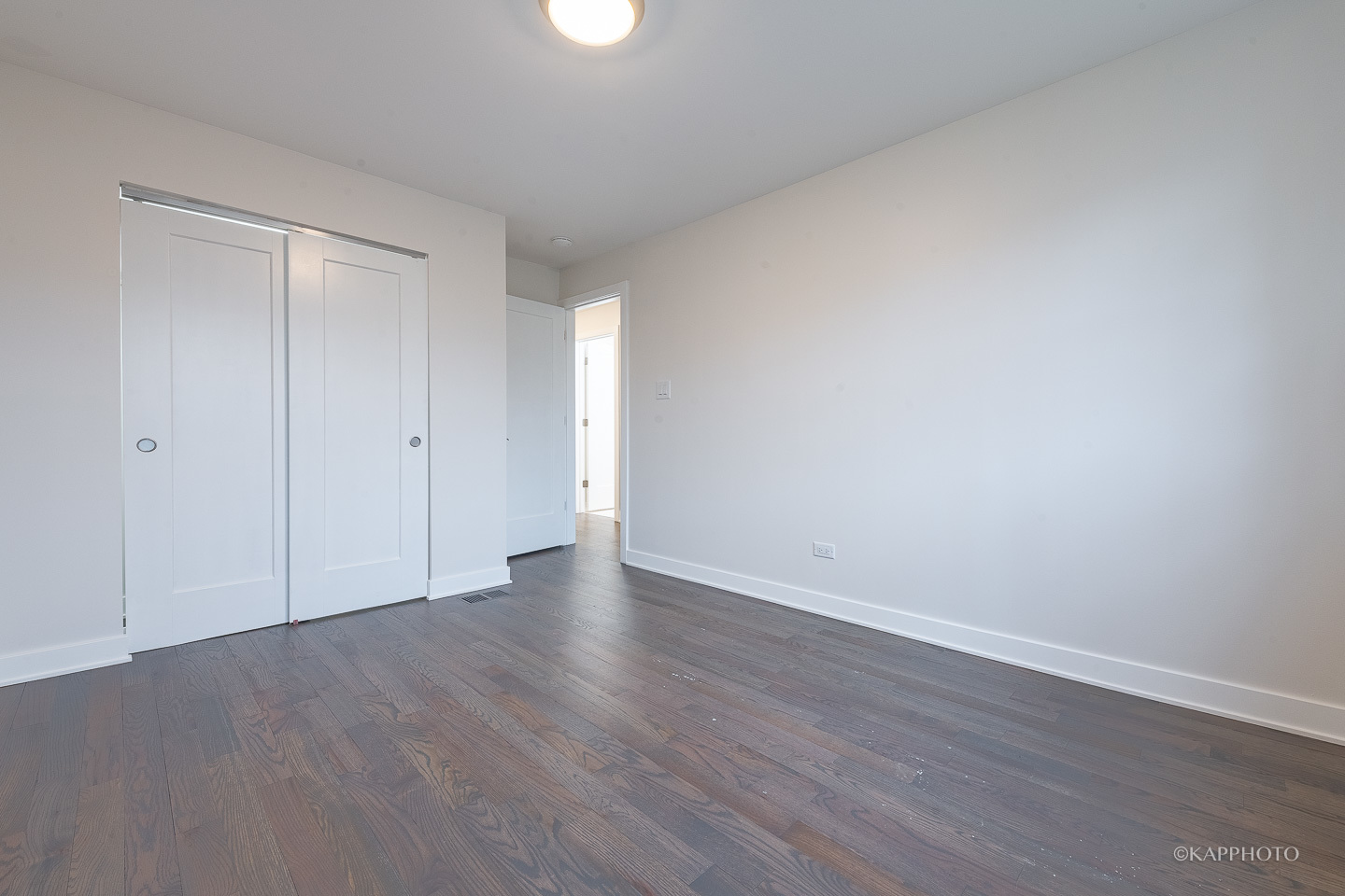 5654 South Princeton Avenue Chicago, IL 60621 - Photo 20 of 29 a view of an empty room and wooden floor
