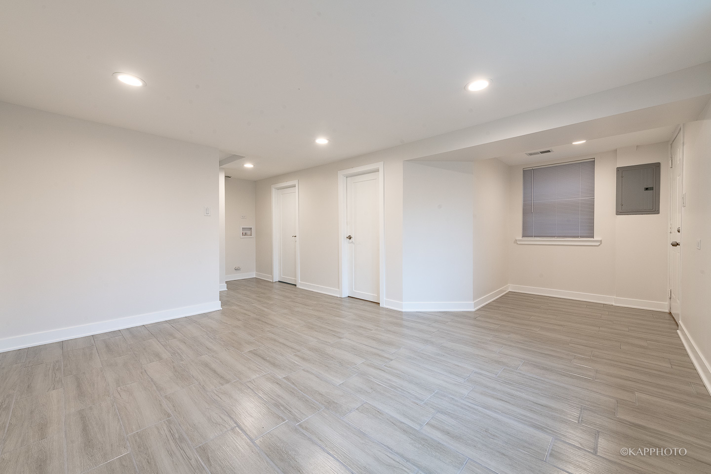 5654 South Princeton Avenue Chicago, IL 60621 - Photo 26 of 29 a view of an empty room with wooden floor
