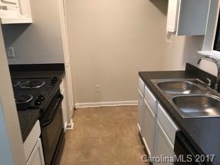 11016 Running Ridge Road Charlotte, NC 28226 - Photo 3 of 8 a kitchen with a sink stove and refrigerator