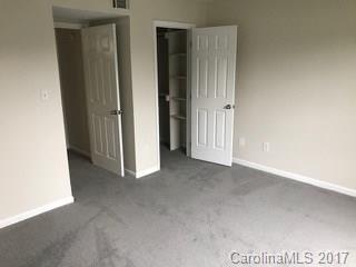 11016 Running Ridge Road Charlotte, NC 28226 - Photo 5 of 8 an empty room with closet