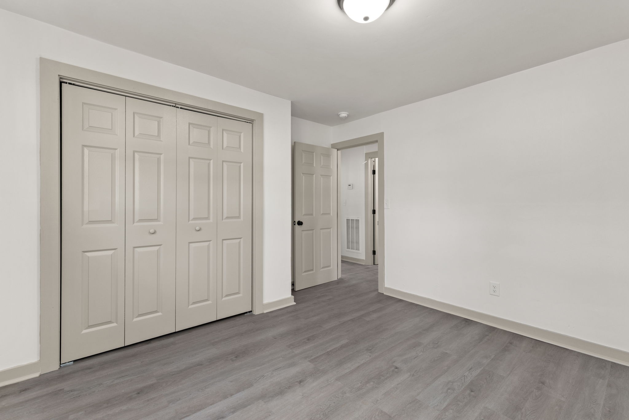 503 5th Street Lawrenceburg, TN 38464 - Photo 15 of 19 a view of an empty room and wooden floor