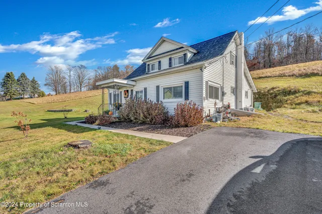 a front view of house with yard