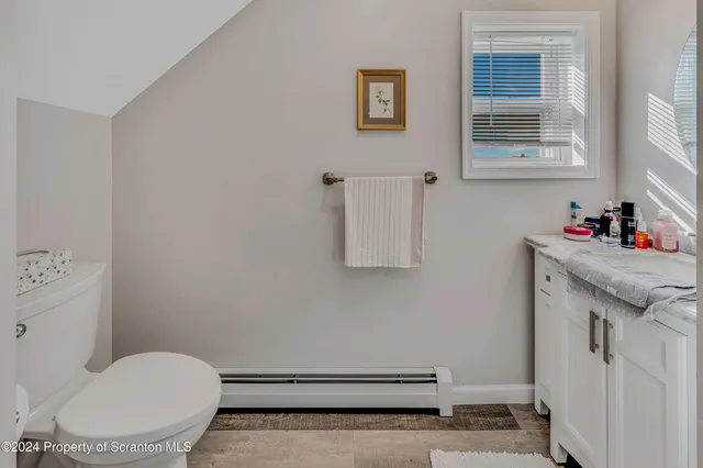 a view of an ocean & house