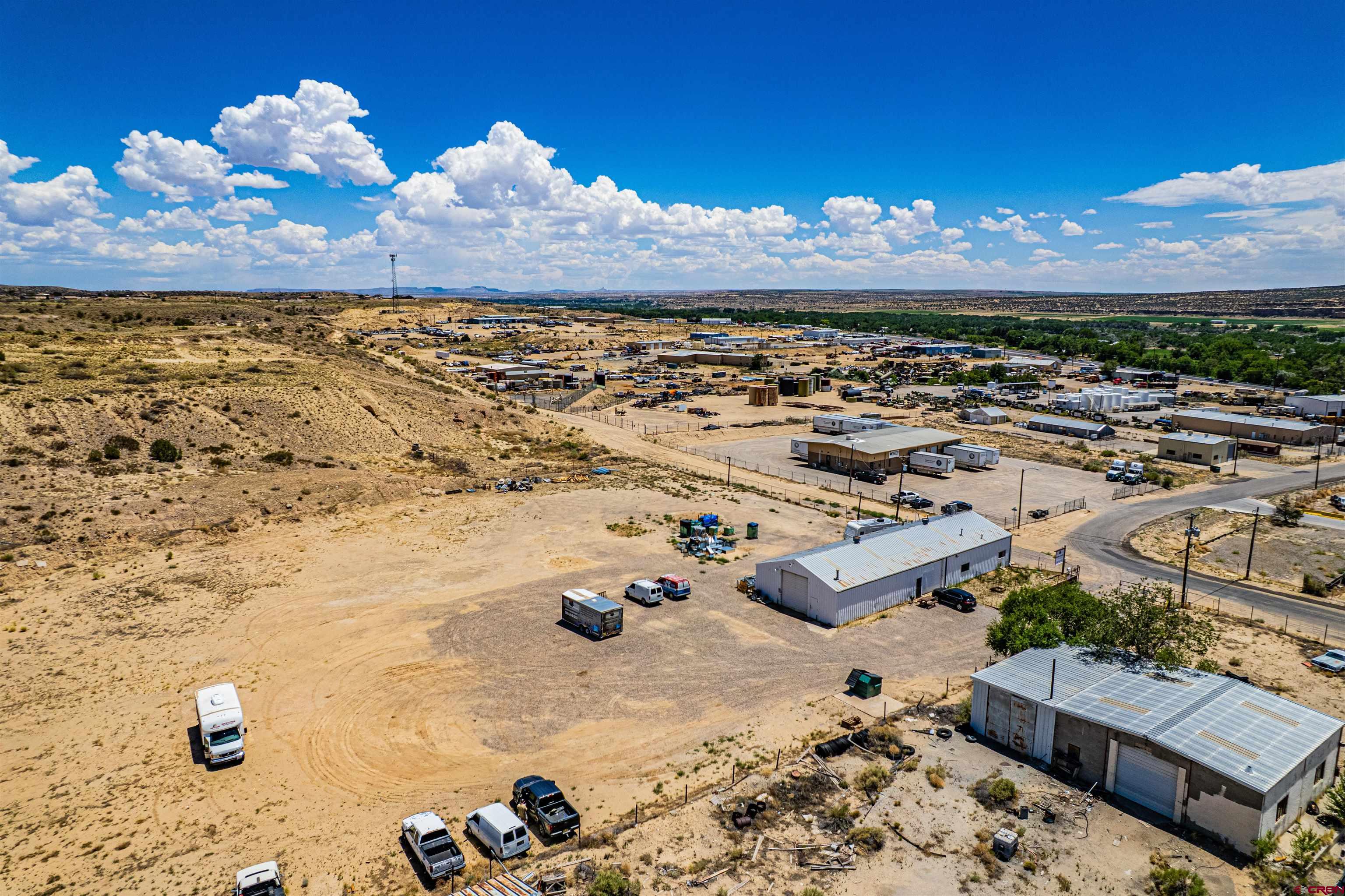4200 Monroe Road Farmington, NM 87401 - Photo 11 of 45 a view of water heater room with wooden floor