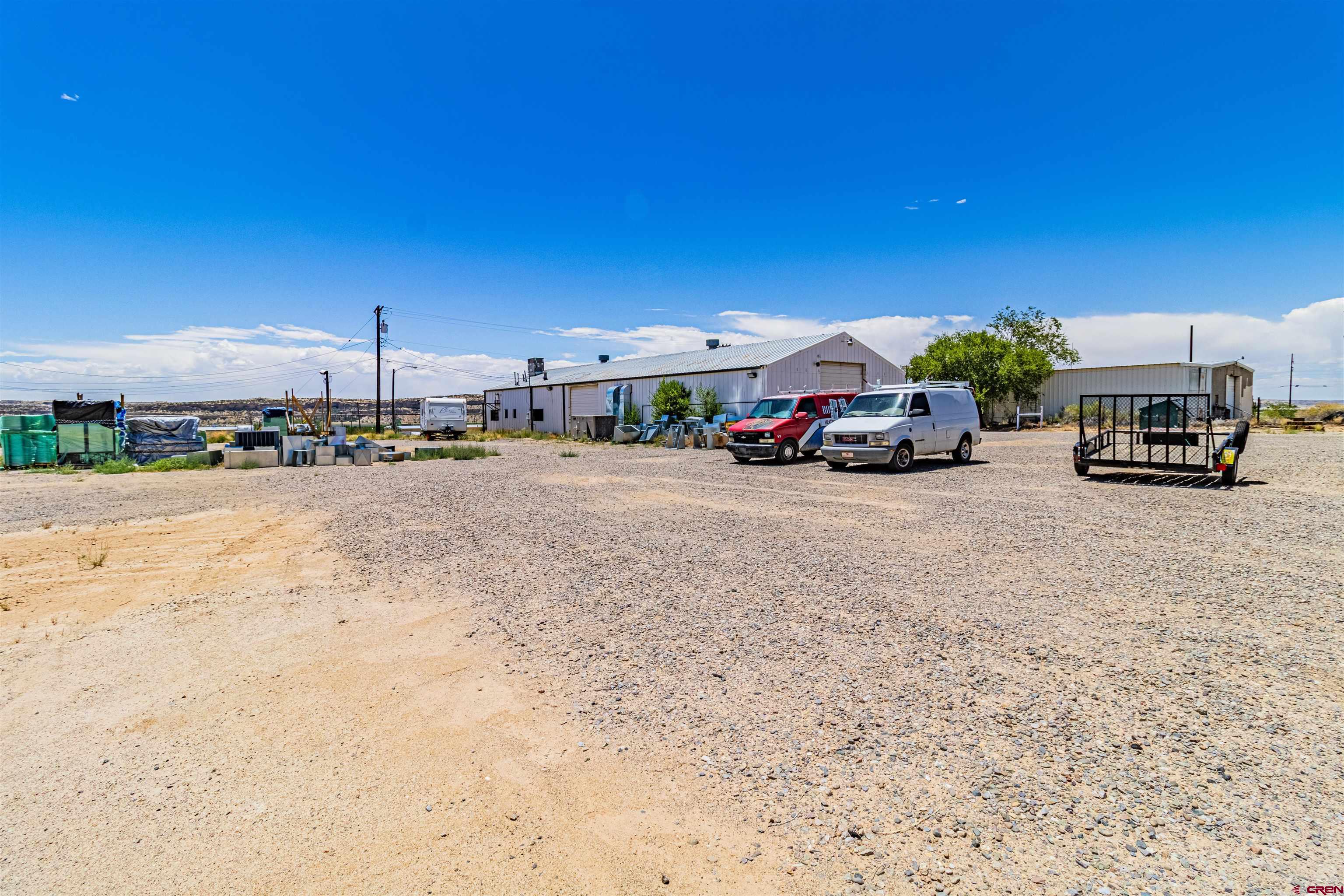 4200 Monroe Road Farmington, NM 87401 - Photo 20 of 45 a view of a cars park in front of building