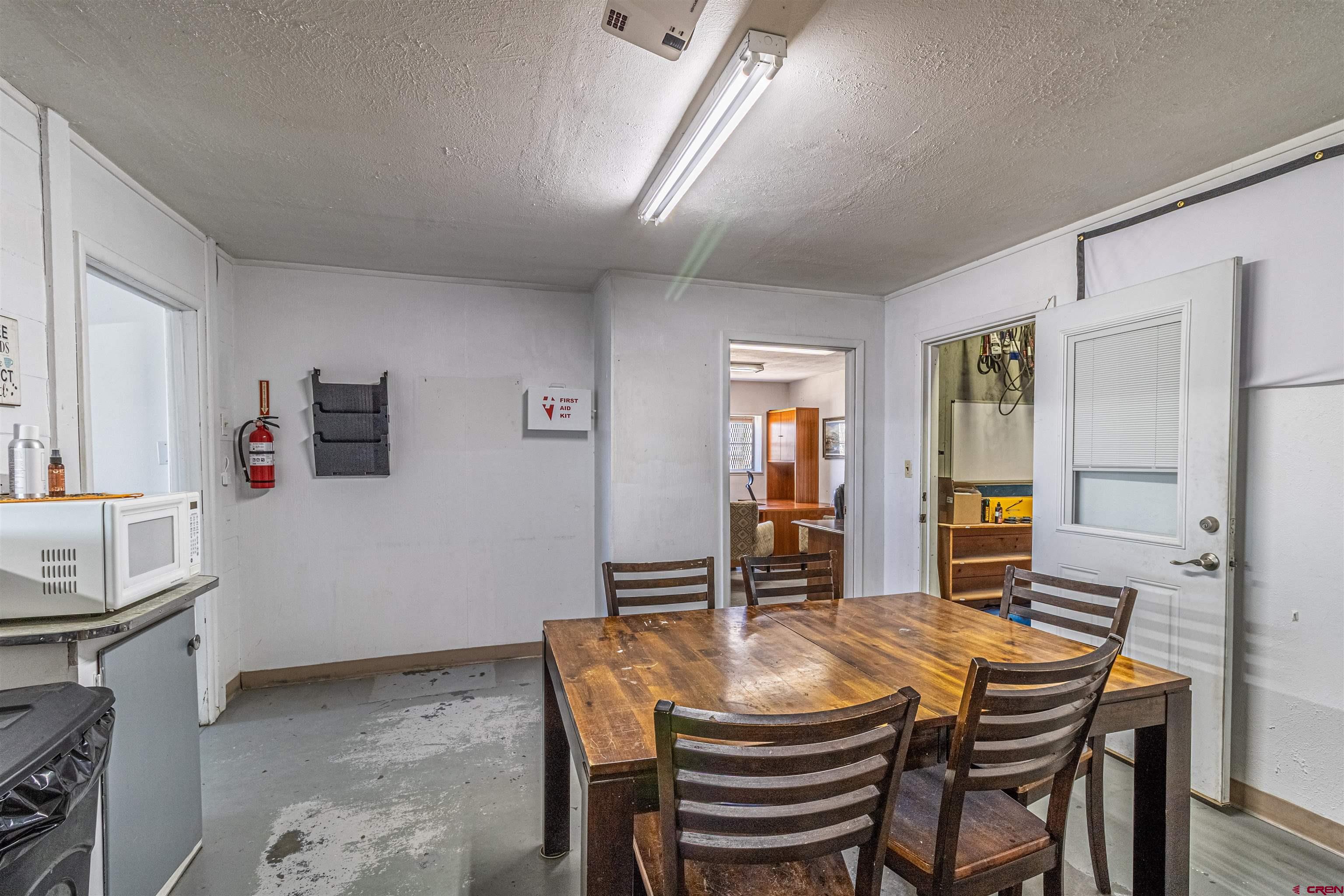 4200 Monroe Road Farmington, NM 87401 - Photo 38 of 45 a view of a dining room with furniture