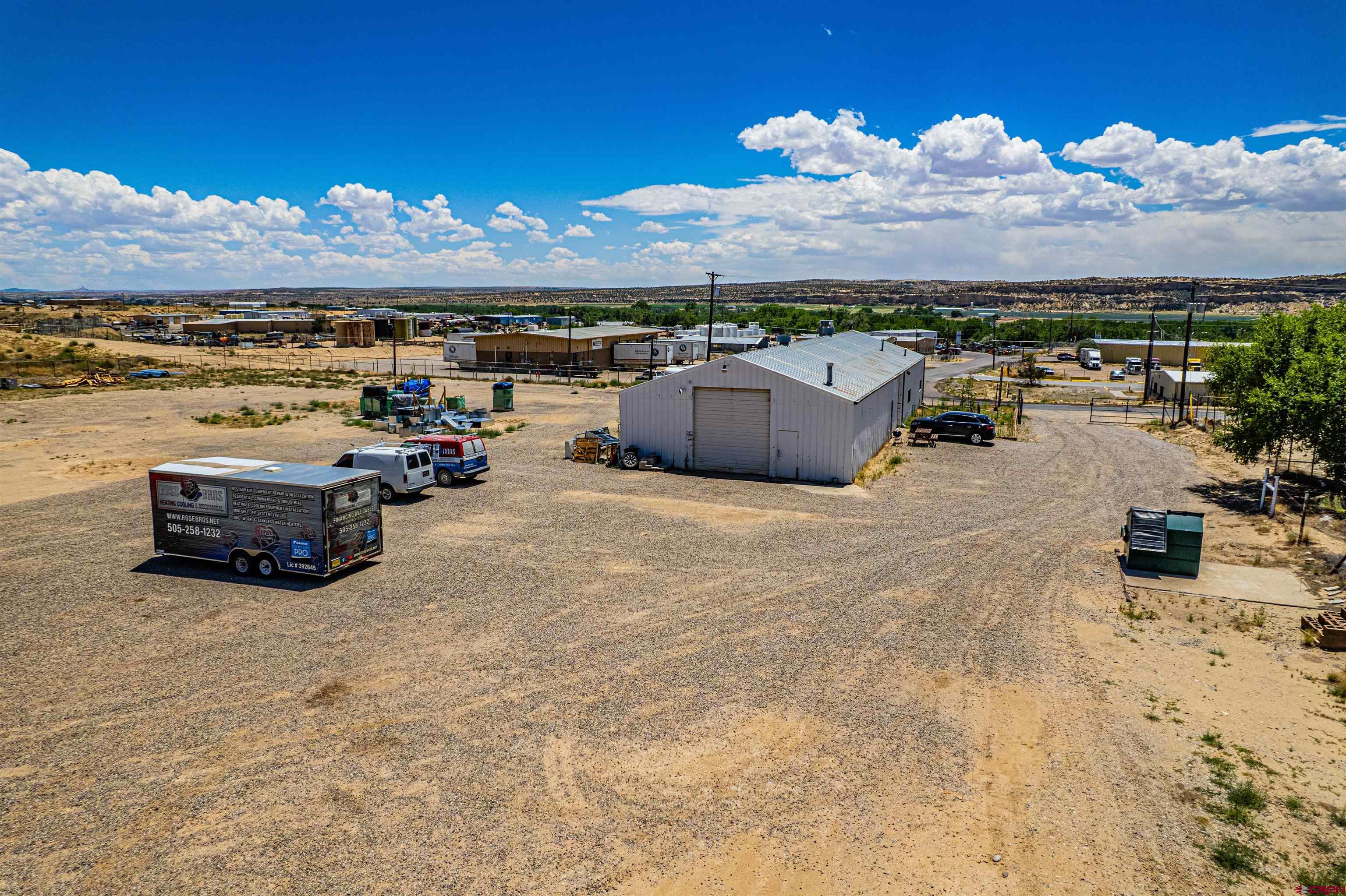 4200 Monroe Road Farmington, NM 87401 - Photo 4 of 45 a view of a terrace with lawn chairs