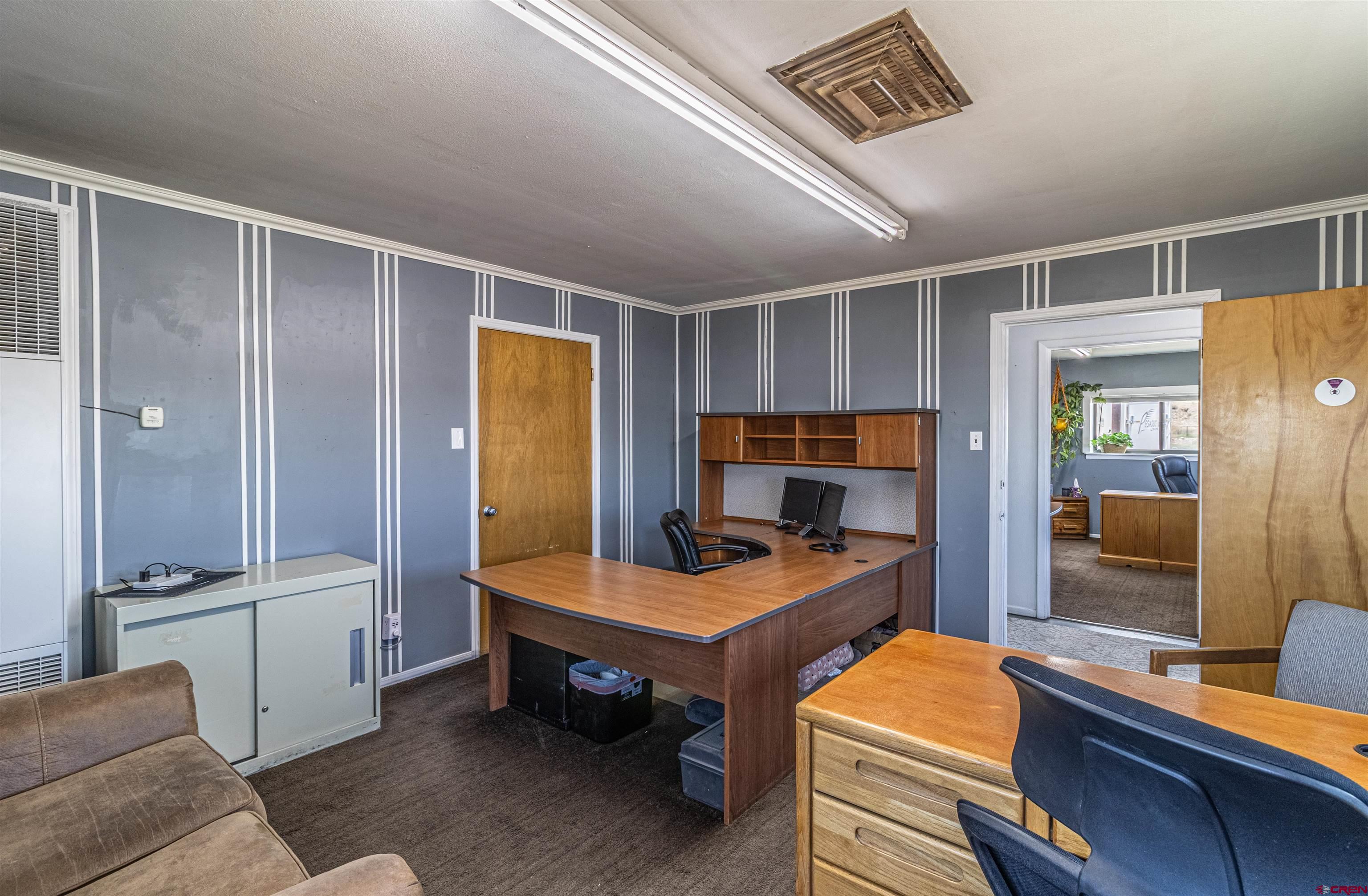 4200 Monroe Road Farmington, NM 87401 - Photo 45 of 45 a bedroom with a workspace