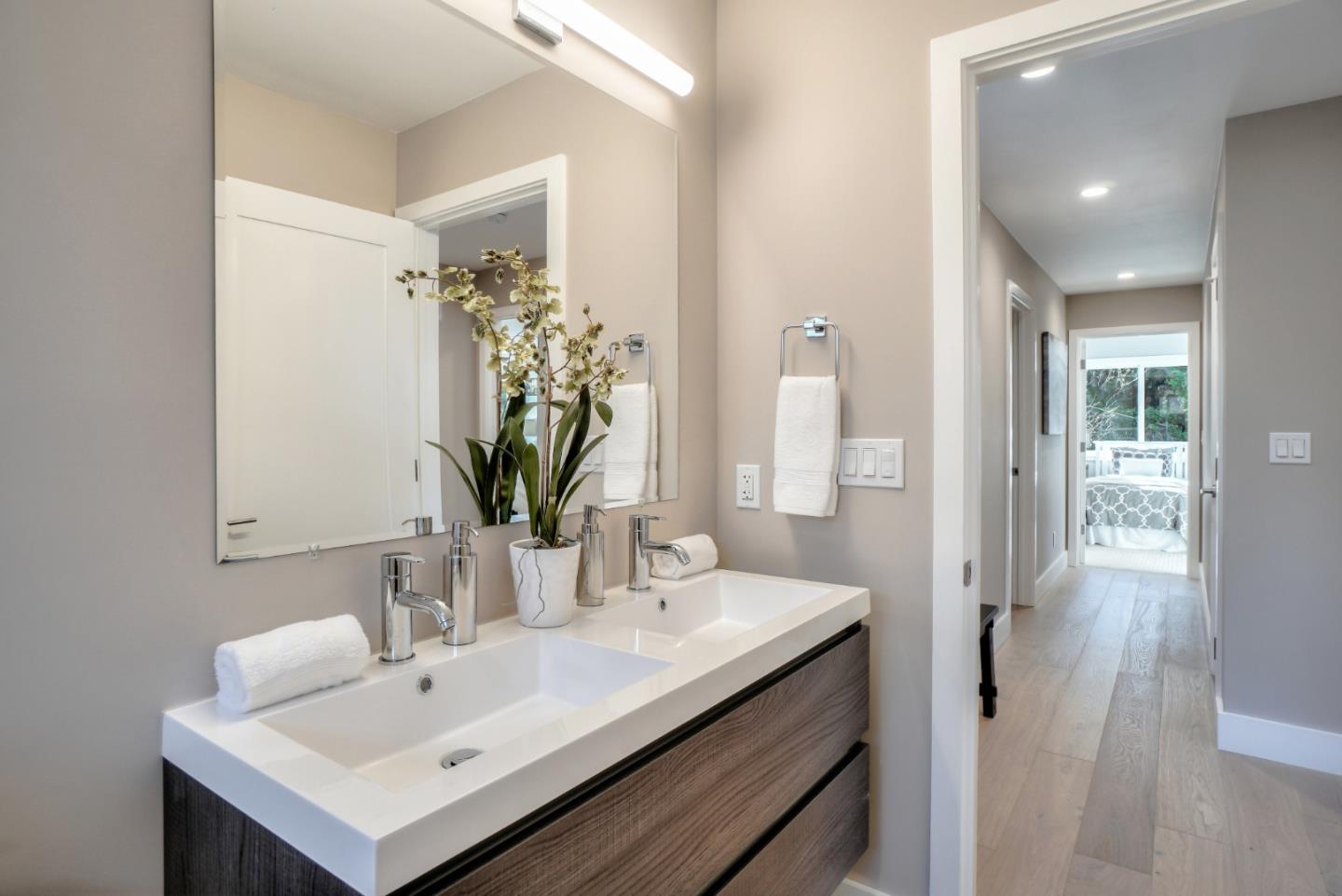 408 San Pablo Terrace Pacifica, CA 94044 - Photo 18 of 34 a bathroom with a sink and a mirror