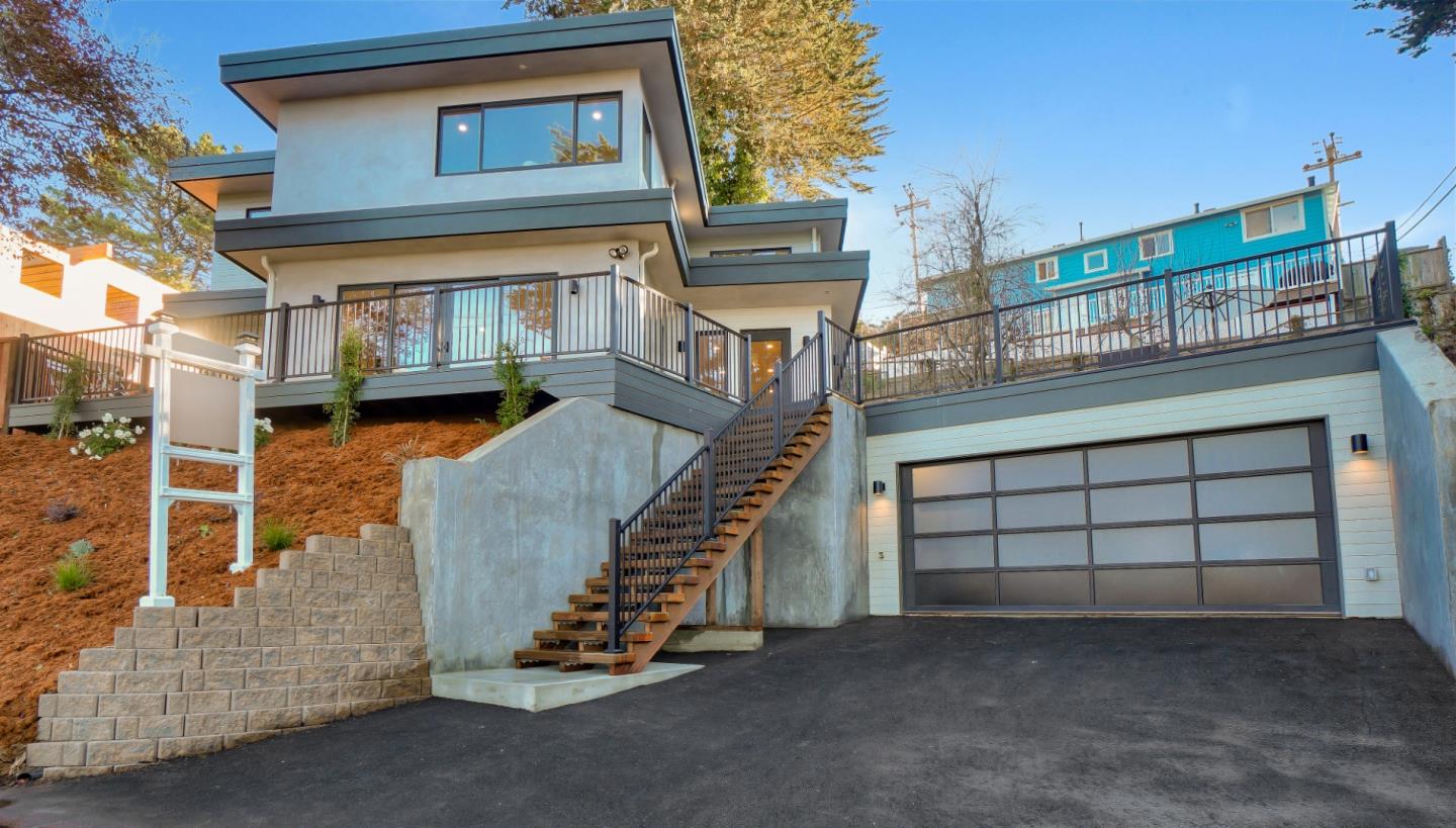 408 San Pablo Terrace Pacifica, CA 94044 - Photo 2 of 34 a view of a house with a large windows
