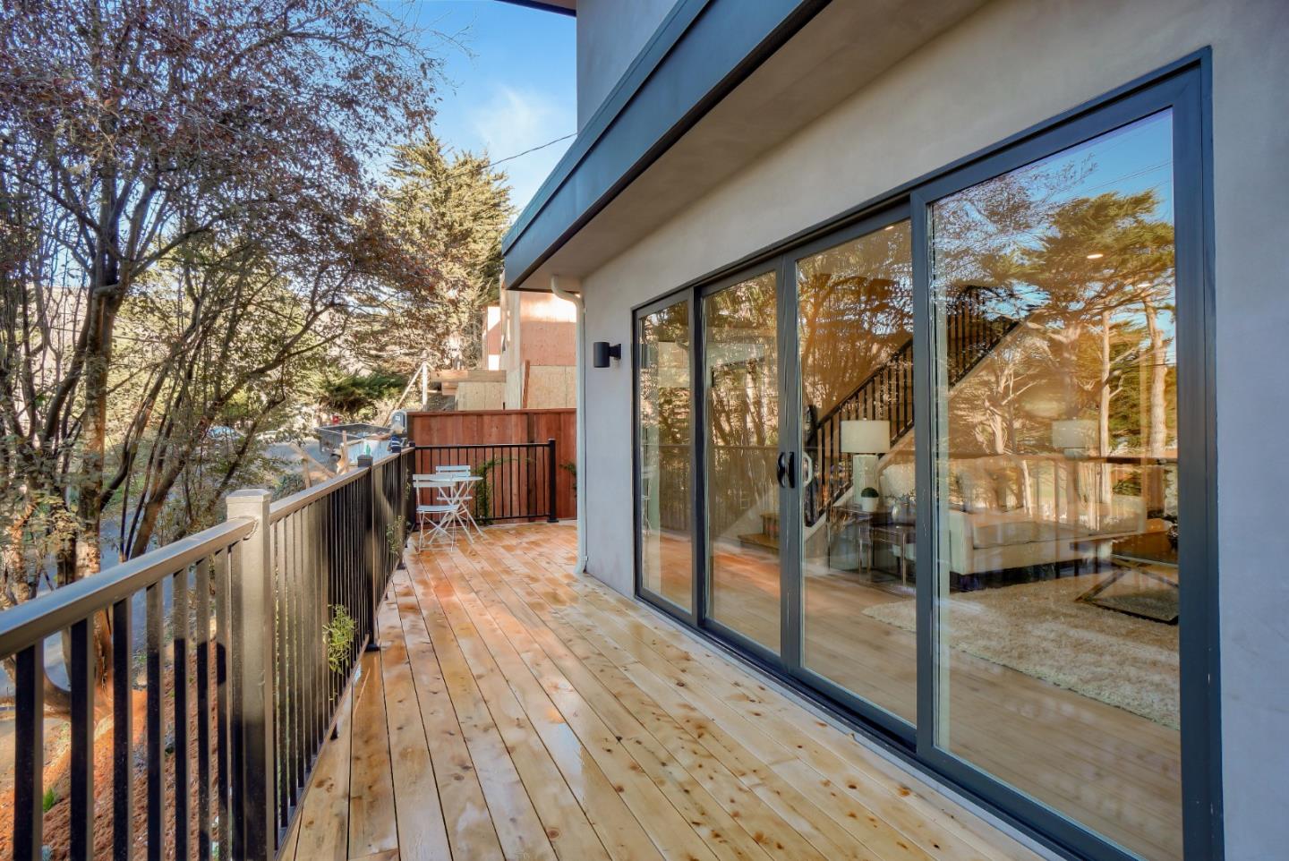 408 San Pablo Terrace Pacifica, CA 94044 - Photo 29 of 34 a view of balcony with wooden floor and fence