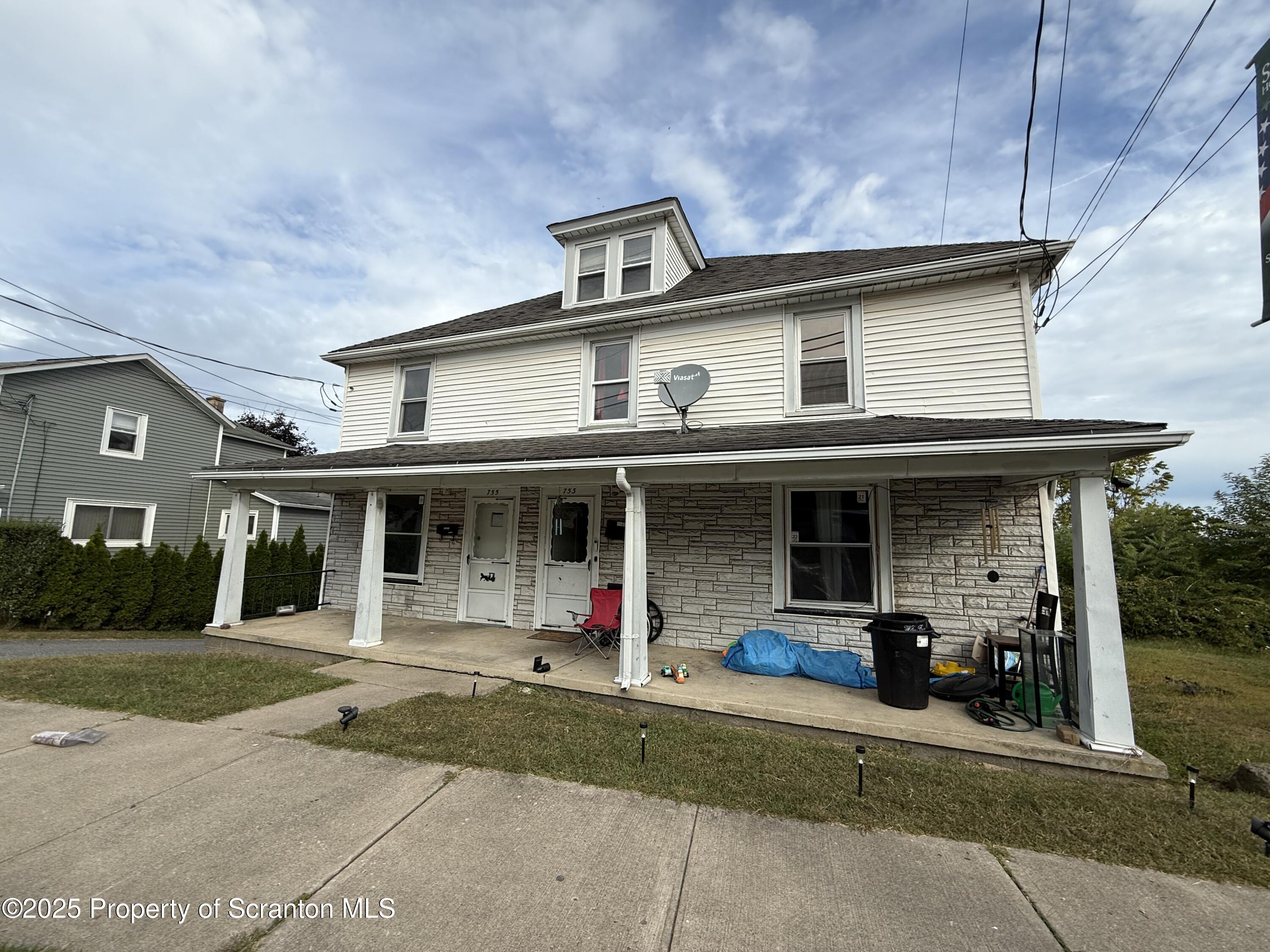755 Main Street Sugar Notch, PA 18706 - Photo 1 of 13 a front view of a house with porch