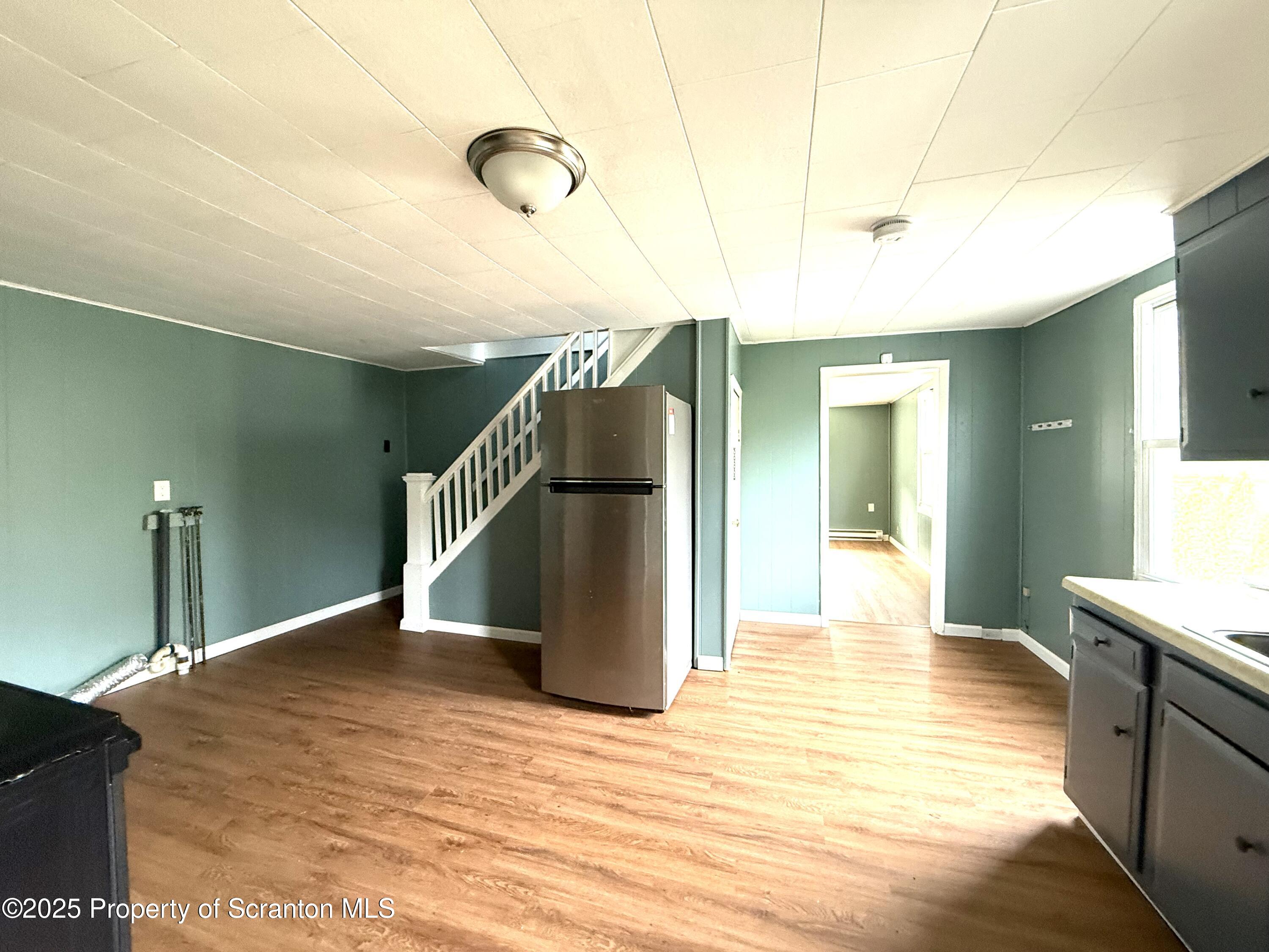 755 Main Street Sugar Notch, PA 18706 - Photo 4 of 13 a view of a hallway with wooden floor
