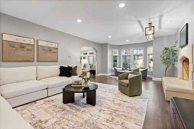 a bathroom with a sink toilet and a window
