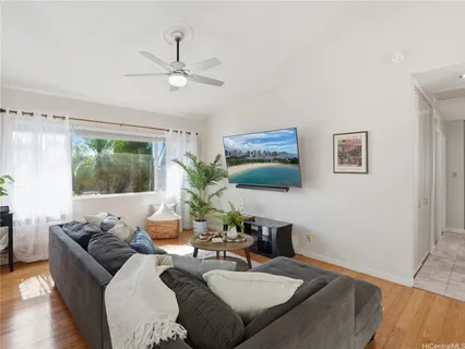 a living room with furniture and window