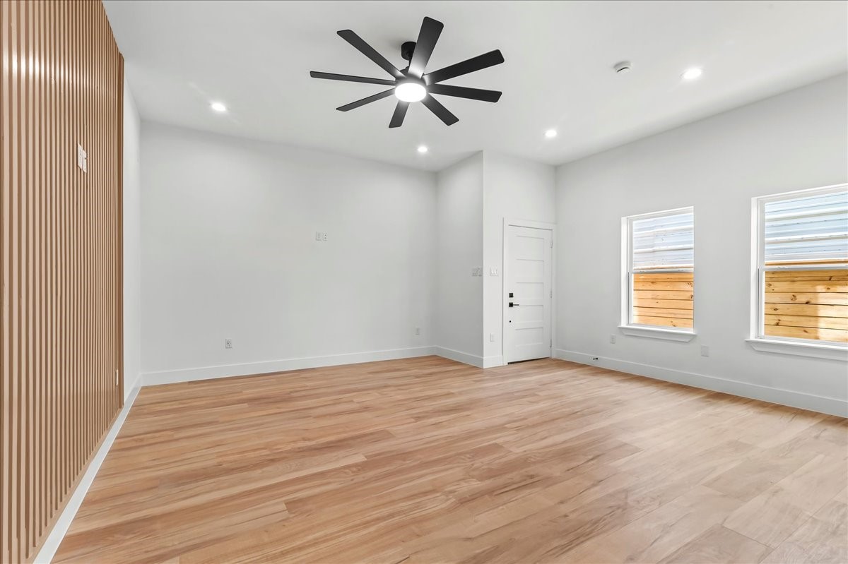 8323 Observatory Street, Unit A/B Houston, TX 77088 - Photo 18 of 38 Unit B - Spacious living area. Accent Wall design may vary. Pictures are from a previous build.
