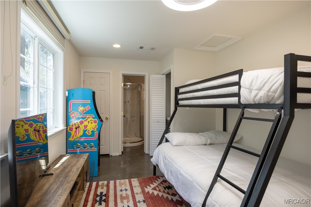 682 Maple Lane Sugarloaf, CA 92386 - Photo 16 of 20 a living room with furniture and a wooden floor