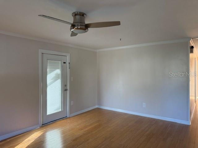 8 Silver Way Ocala, FL 34472 - Photo 2 of 19 a view of a room with wooden floor and a window