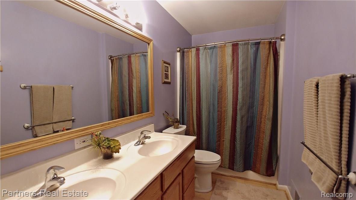 5371 Dutton Road Gregory, MI 48137 - Photo 26 of 72 Master Bath/ Double sinks! Has two linen closets ! Amazing storage in this entire home!