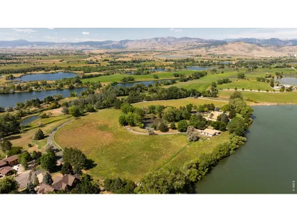 a view of an aerial view of residential houses with outdoor space
