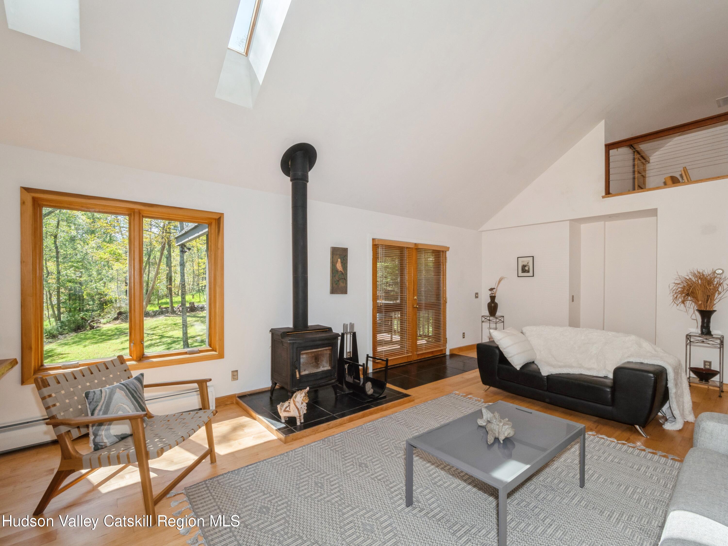 7 Clovewood Road High Falls, NY 12440 - Photo 11 of 41 a living room with furniture and a window