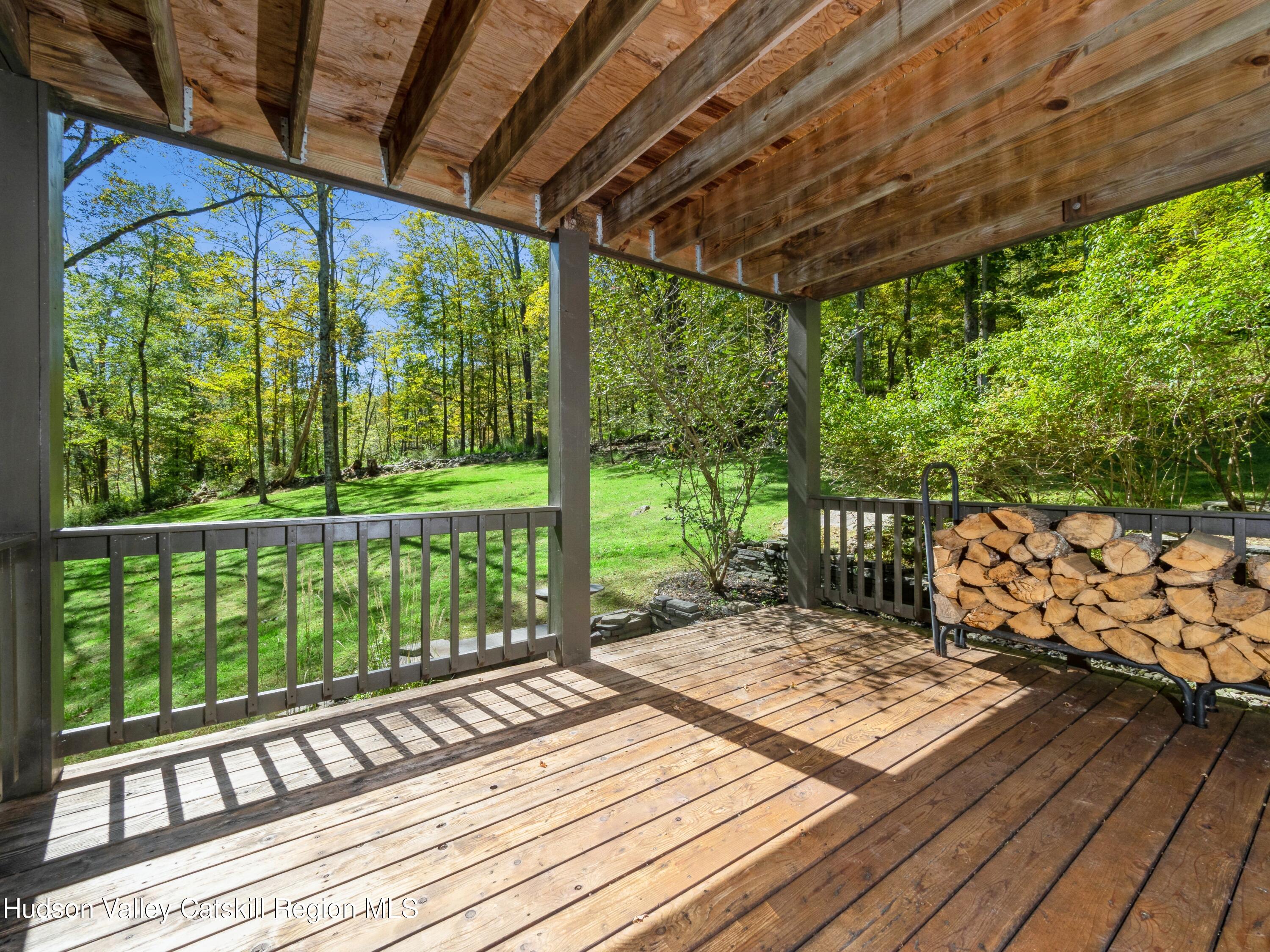 7 Clovewood Road High Falls, NY 12440 - Photo 23 of 41 a balcony with wooden floor in outdoor space