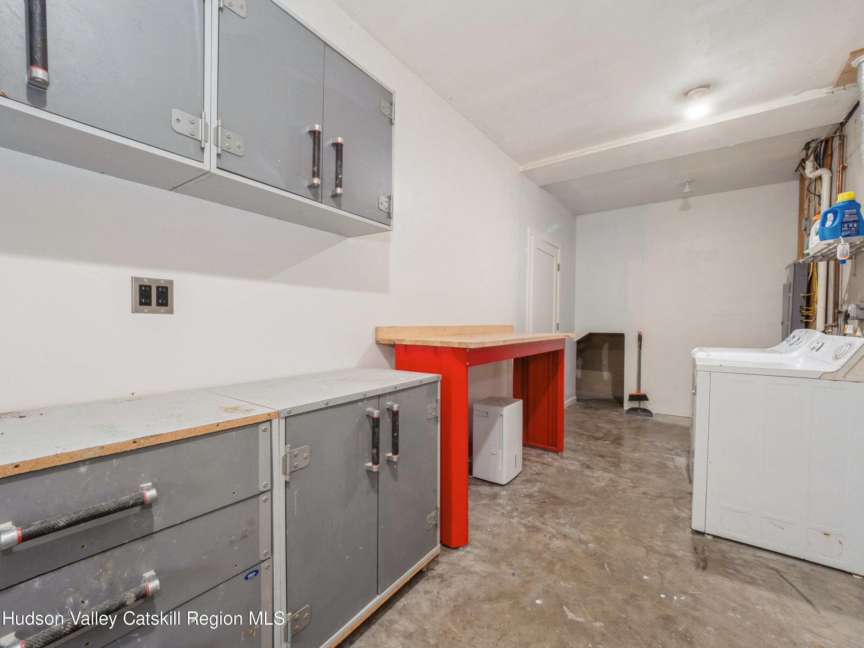 7 Clovewood Road High Falls, NY 12440 - Photo 36 of 41 a utility room with cabinets washer and dryer