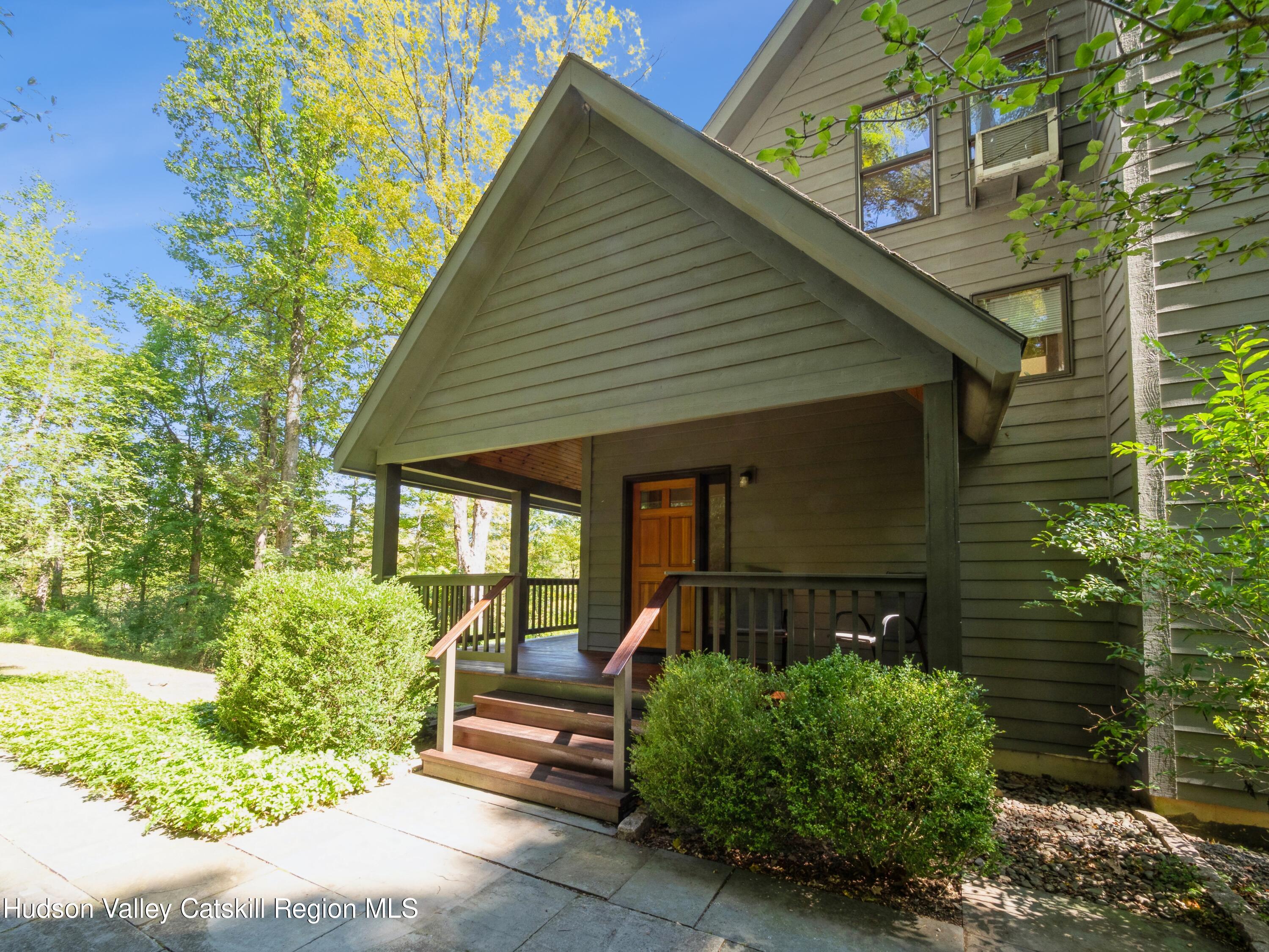 7 Clovewood Road High Falls, NY 12440 - Photo 9 of 41 a front view of a house with garden