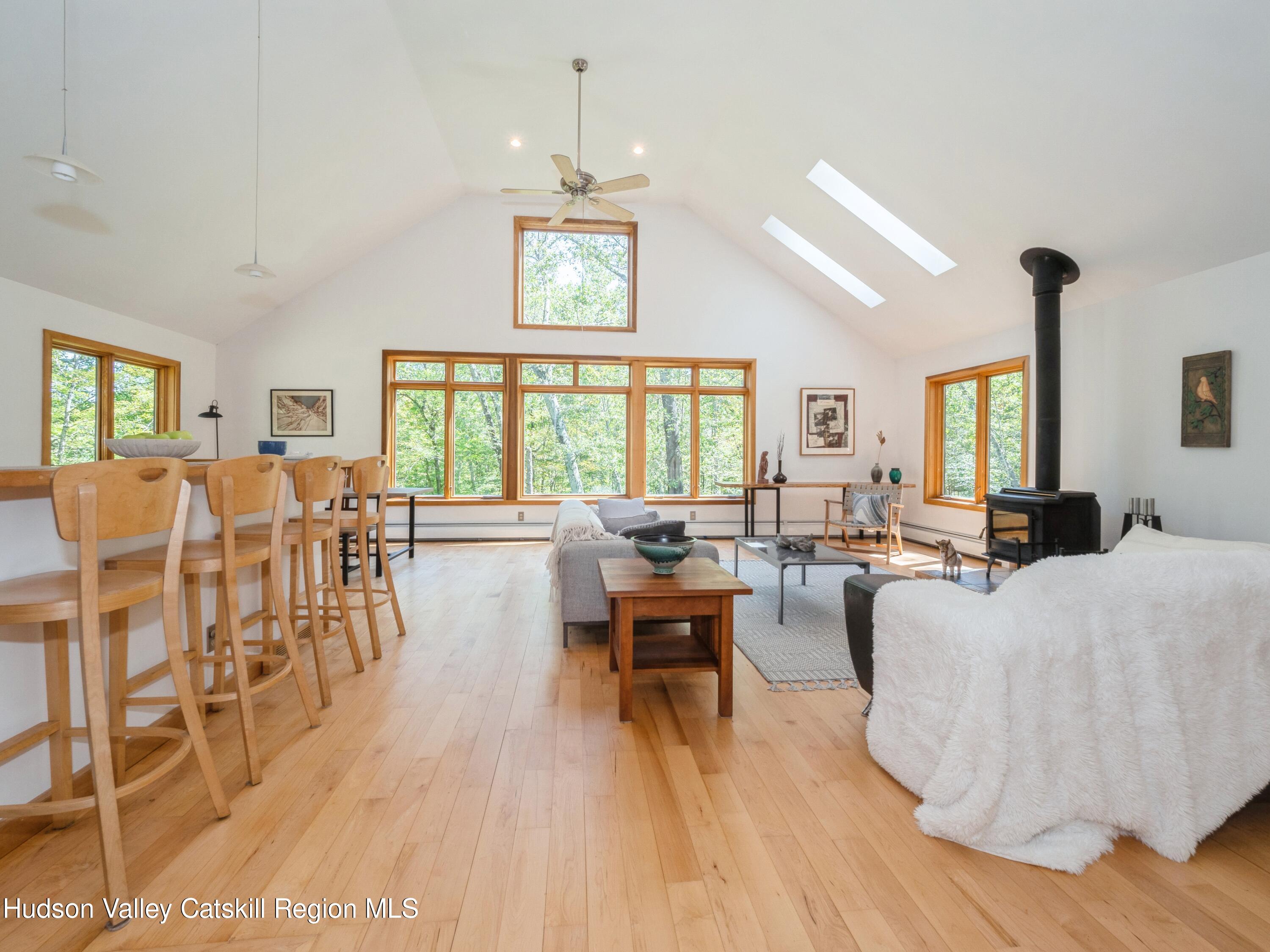 7 Clovewood Road High Falls, NY 12440 - Photo 10 of 41 a living room with lots of furniture and a wooden floor