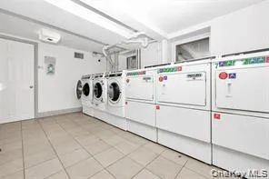 a white refrigerator freezer sitting inside of a kitchen