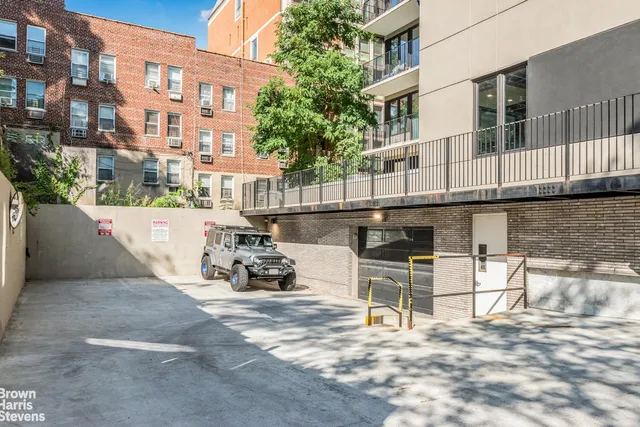 a view of a chairs and a table in the patio