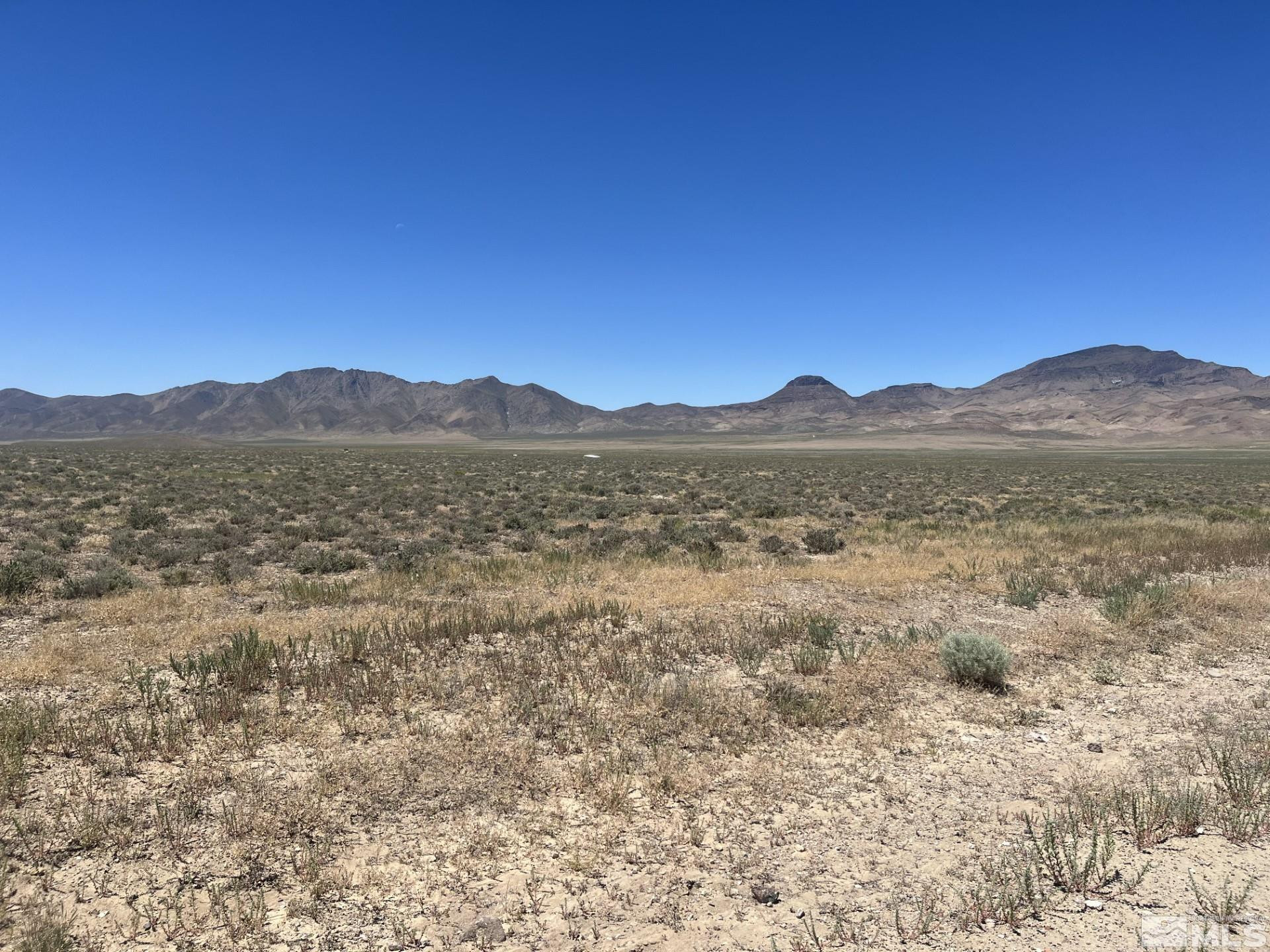 a view of mountain with lake view