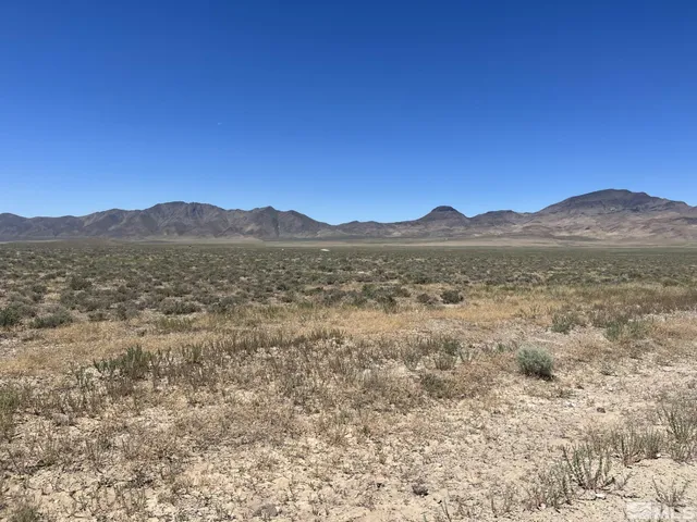 a view of mountain with lake view