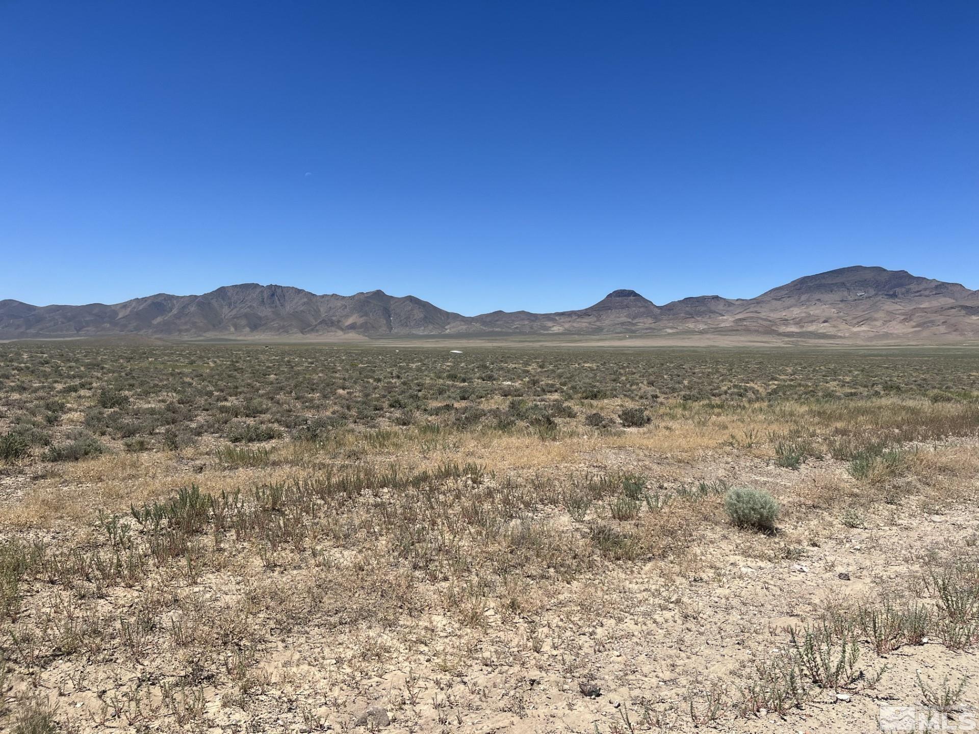 a view of mountain with lake view