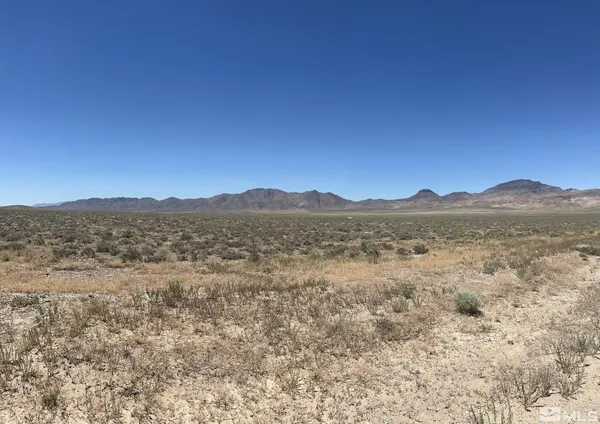 a view of an outdoor space and mountain view