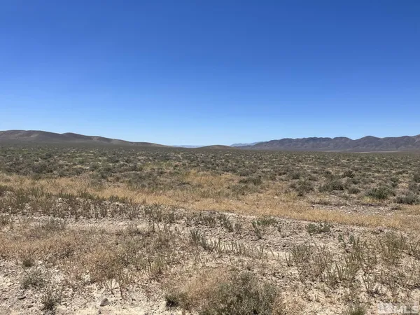 a view of an outdoor space and a mountain view