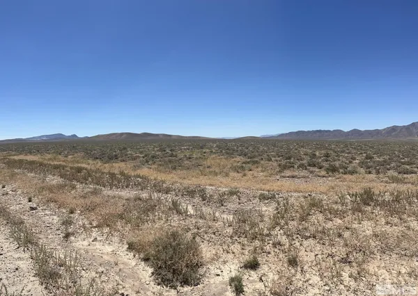 a view of an outdoor space with mountain view