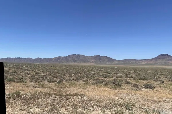 a view of an lake with a mountain in the background