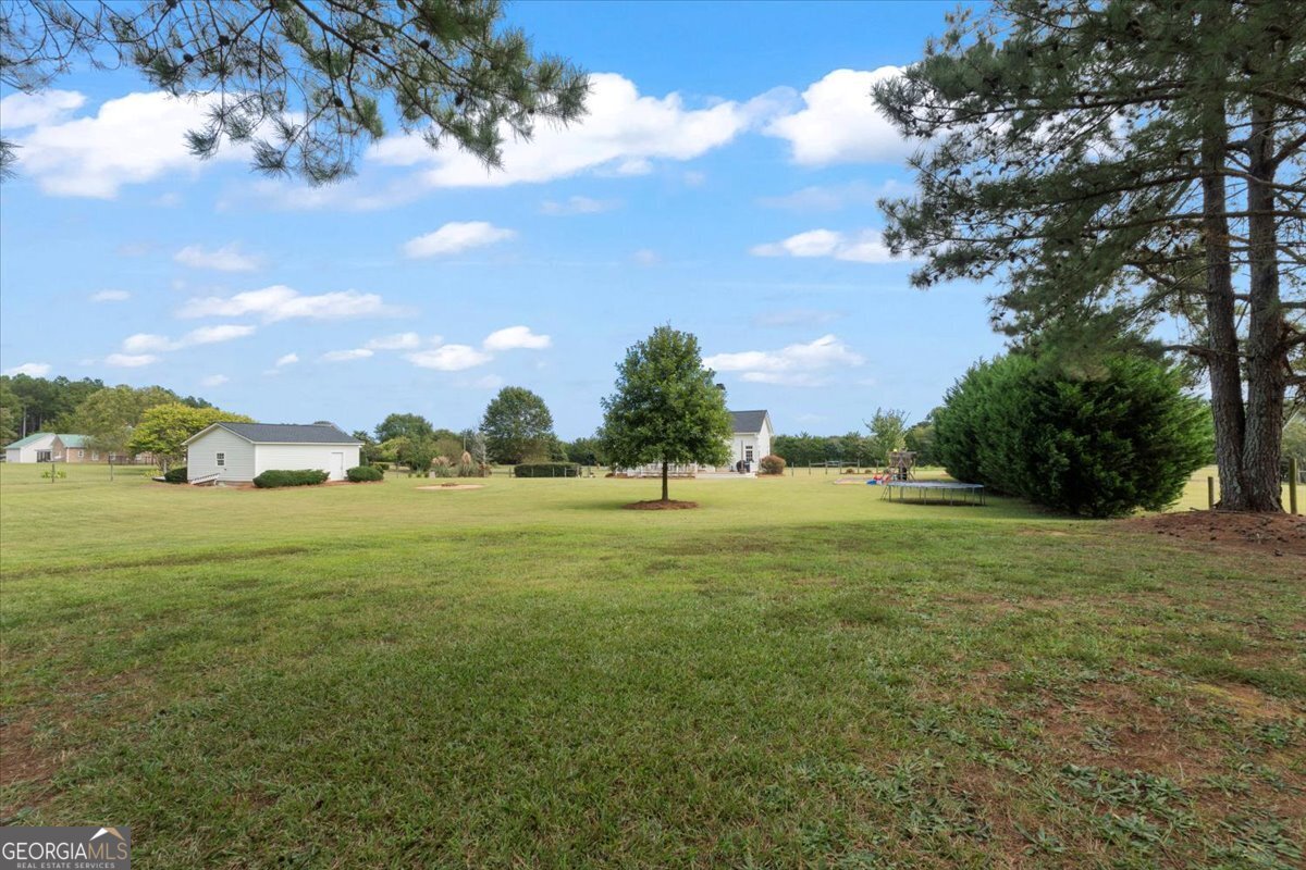 1670 Price Mill Road Bishop, GA 30621 - Photo 13 of 53 a view of a field with an trees