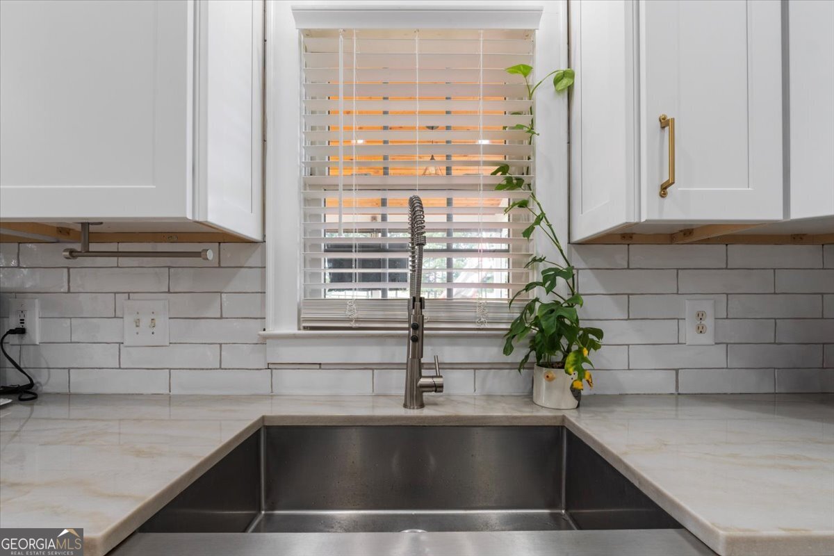 1670 Price Mill Road Bishop, GA 30621 - Photo 29 of 53 a kitchen with a sink and a window