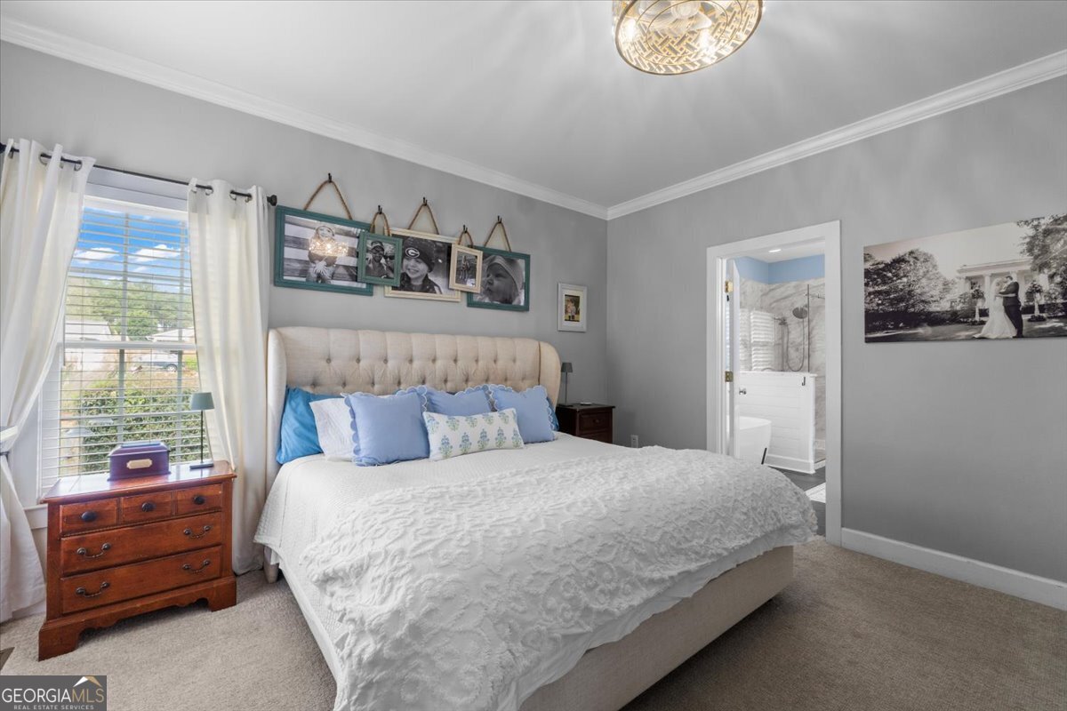 1670 Price Mill Road Bishop, GA 30621 - Photo 31 of 53 a bedroom with a bed and a window